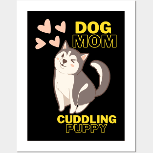 Dog mom Cuddling Puppy Posters and Art